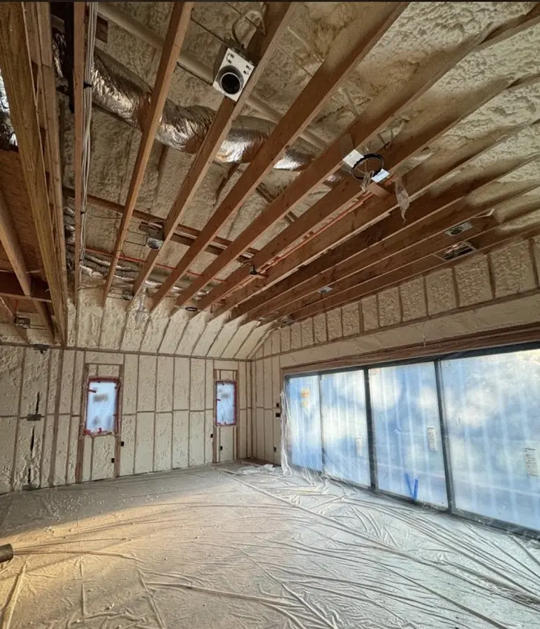 Interior walls and ceiling insulated with spray foam during new construction in Orland Park